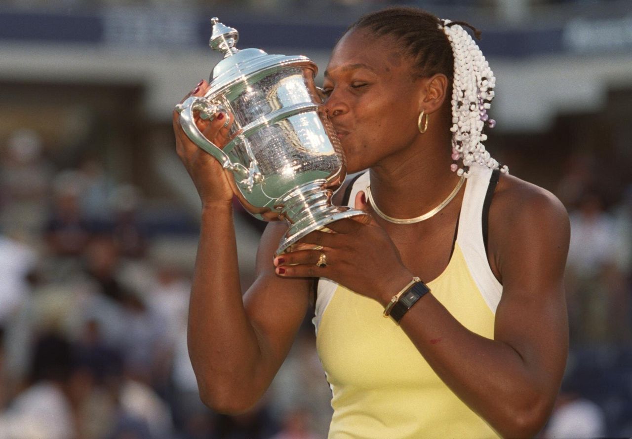 Williams wins her first major Grand Slam title after beating Switzerland's Martina Hingis in 1999.