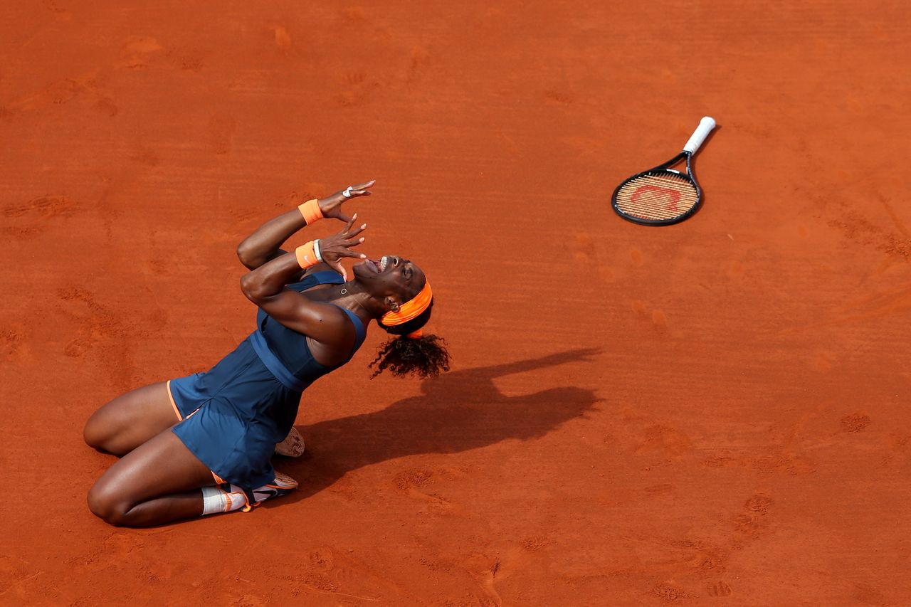 Williams celebrates a match point in a game against Russia's Maria Sharapova during the French Open in Paris on June 8, 2013.