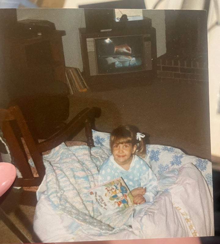 The author in her reading nest as a child.