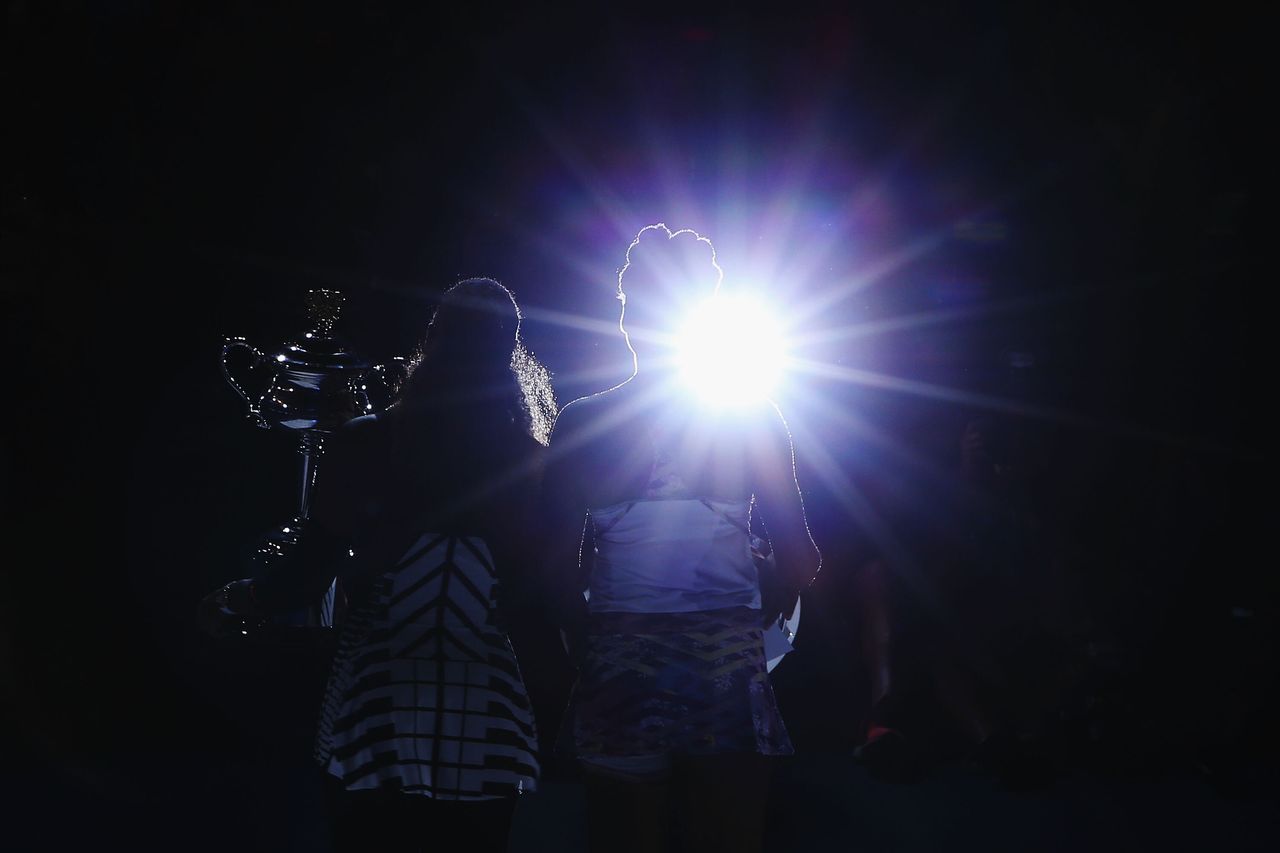 Williams poses with a trophy after winning the women's singles final against her sister Venus during the Australian Open in Melbourne, Australia, on Jan. 28, 2017.