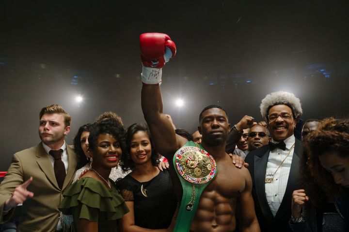Trevante Rhodes (second from right) and Russell Hornsby (far right) as boxer Mike Tyson and promoter Don King in the Hulu series "Mike."