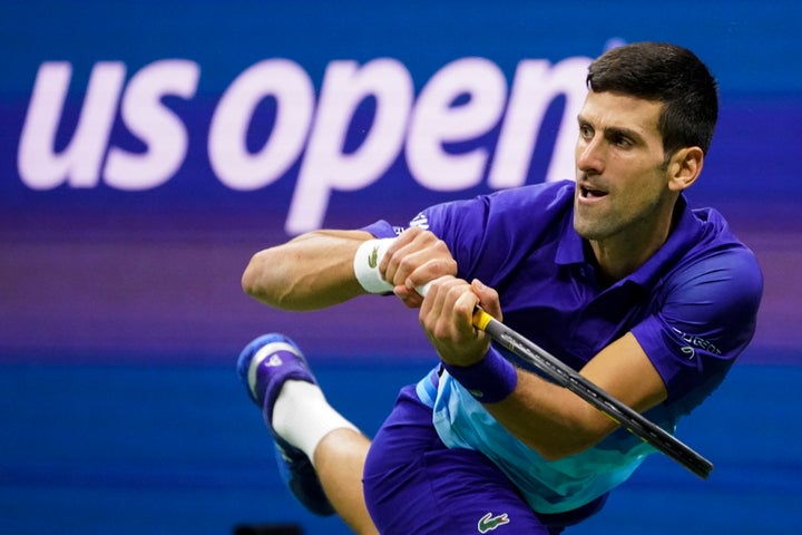 Novak Djokovic, of Serbia, returns a shot to Alexander Zverev, of Germany, during the semifinals of the U.S. Open tennis championships, Friday, Sept. 10, 2021, in New York.