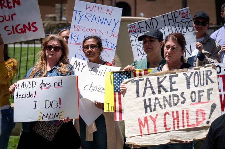 Parents opposed to the Los Angeles School District's COVID-19 vaccination mandate for students rally outside the school district office on May 10.