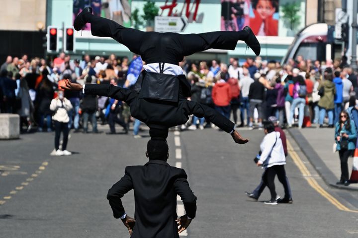 Two performers promote their show during the Edinburgh Festival Fringe. 