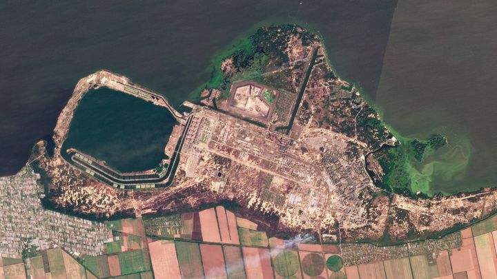 This composite of satellite imagery taken by Planet Labs PBC shows smoke billowing from a fire at the Zaporozhye nuclear power plant in southeastern Ukraine on Thursday, Aug. 25, 2022. 