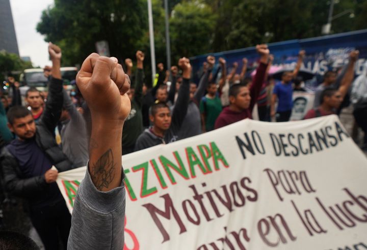Demonstrators take part in a march to seek justice for the 43 Ayotzinapa students who disappeared in Mexico City on Friday, August 26, 2022. 
