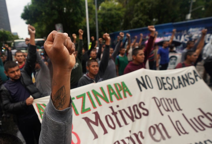 Demonstrators take part in a march to seek justice for the 43 Ayotzinapa students who disappeared in Mexico City on Friday, August 26, 2022.