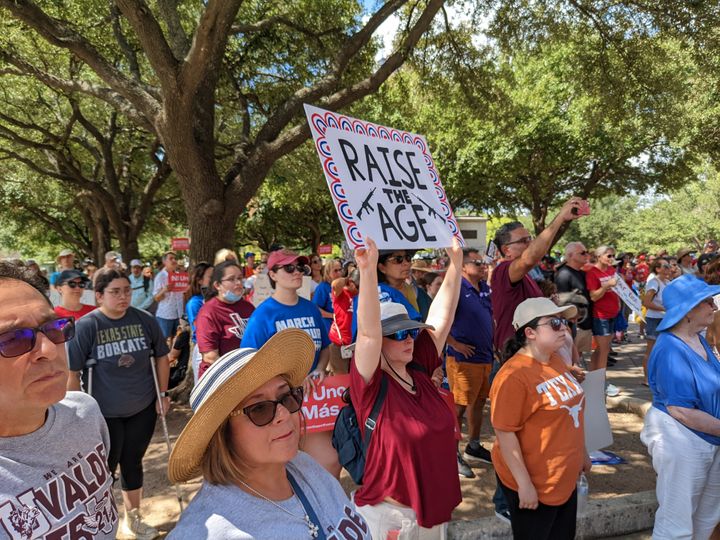 Protesters gather in front of the Texas capitol in Austin to demand that Gov. Greg Abbott call a special session to raise the age to buy a semi-automatic rifle to 21.