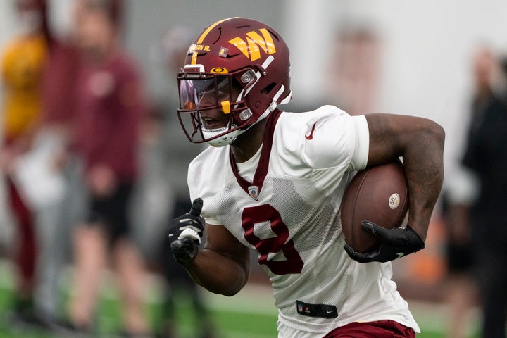 Washington Commanders running back Brian Robinson Jr., runs during Rookie Mini Camp practice at the team's NFL football training facility on May 6 in Ashburn, Virginia.