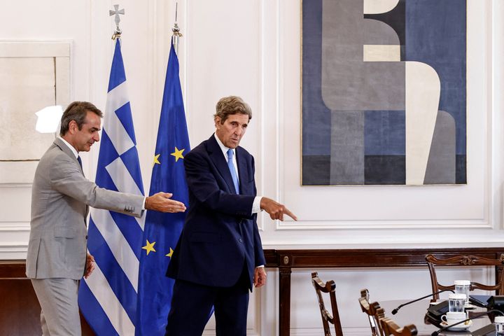 Greek Prime Minister Kyriakos Mitsotakis welcomes U.S. Special Envoy on Climate Change John Kerry at the Maximos Mansion, in Athens, Greece, August 29, 2022. REUTERS/Alkis Konstantinidis