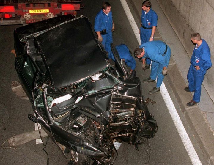 In this early Sunday, Aug. 31, 1997 file photo, police services prepare to take away the car in which Britain's Diana, Princess of Wales, died in Paris, in a car crash that also killed her companion Dodi Fayed, and chauffeur. 