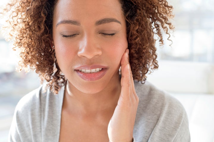 Headaches, jaw pain and toothaches are all signs of nighttime teeth grinding.