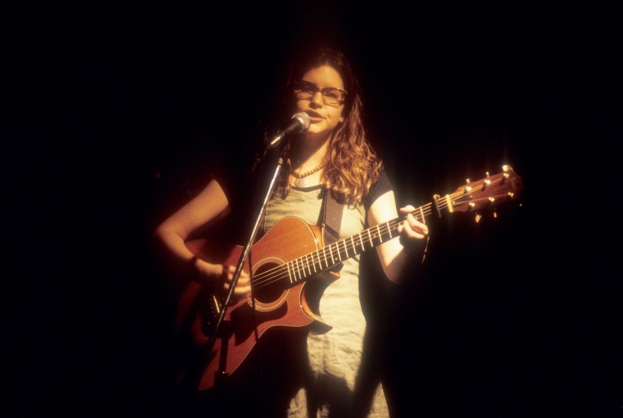 Loeb singing at CBGB, a New York City music club, in 1994.