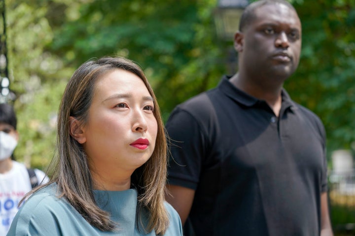 New York Assembly Member Yuh-Line Niou (left) stands with Jones (right) at a press conference criticizing rival Dan Goldman on Aug. 15. Goldman benefited from a crowded progressive lane.