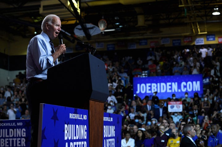 President Joe Biden participates in a rally for the Democratic National Committee (DNC) at Richard Montgomery High School in Rockville, Maryland, on August 25, 2022.