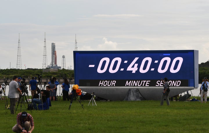 NASA's Artemis 1 rocket sits at pad 39-B at the Kennedy Space Center hours before a scheduled launch on Monday in Cape Canaveral, Florida. The launch of the moon rocket was postponed due to an issue with one of the rocket's engines.