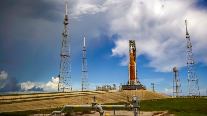 NASA's next-generation moon rocket, the Space Launch System (SLS) rocket with its Orion crew capsule perched on top, stands on launch pad 39-B in preparation for the Artemis 1 mission, at Cape Canaveral, Florida.