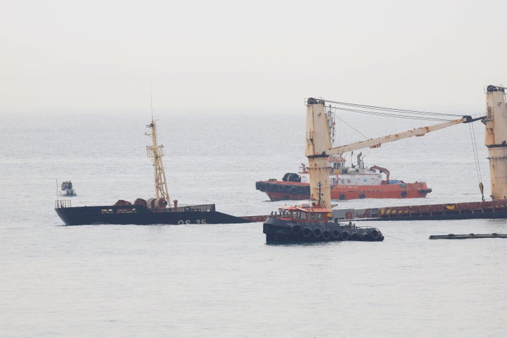 Cargo ship OS 35 is half sunk in Catalan Bay after colliding with LNG tanker ADAM LNG near Gibraltar, August 30, 2022. REUTERS/Jon Nazca