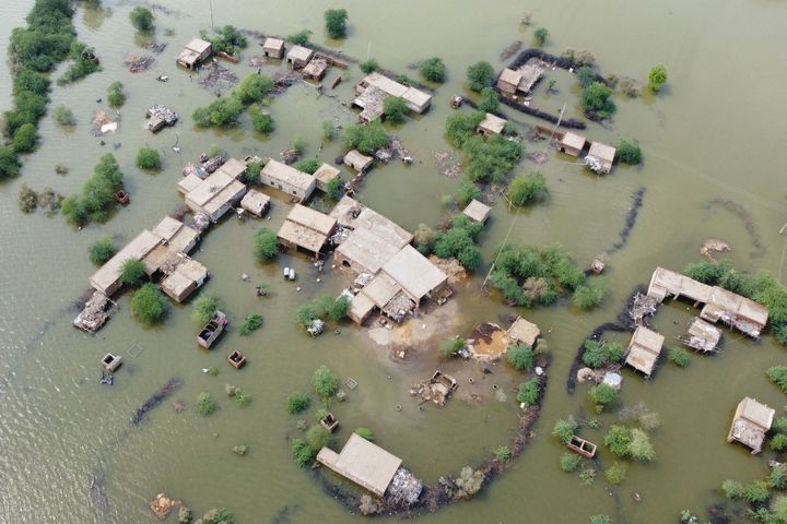 This aerial view shows a flooded residential area in Dera Allah Yar town after heavy monsoon rains in Jaffarabad district.