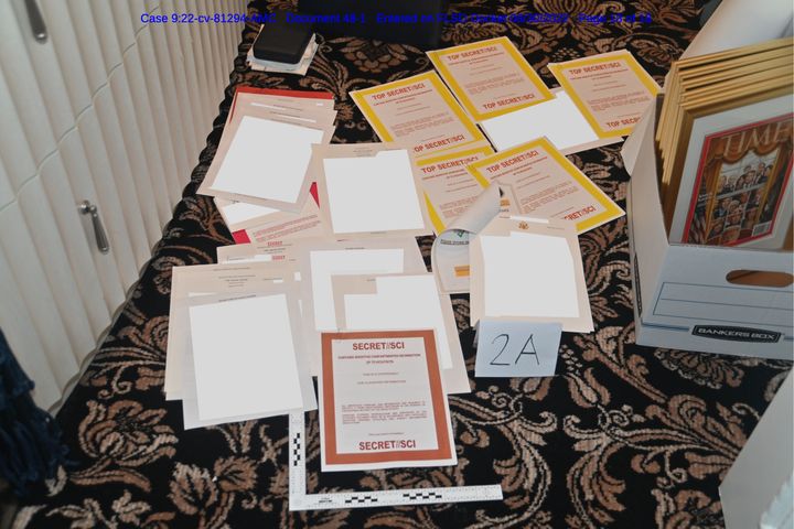 A photo from a Department of Justice brief shows some of the documents seized in the raid at Mar-a-Lago.