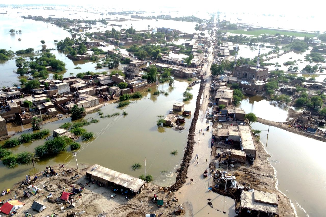 Homes are surrounded by floodwaters in Sohbat Pur city of Jaffarabad, a district of Pakistan's southwestern Baluchistan province on Aug. 29, 2022.