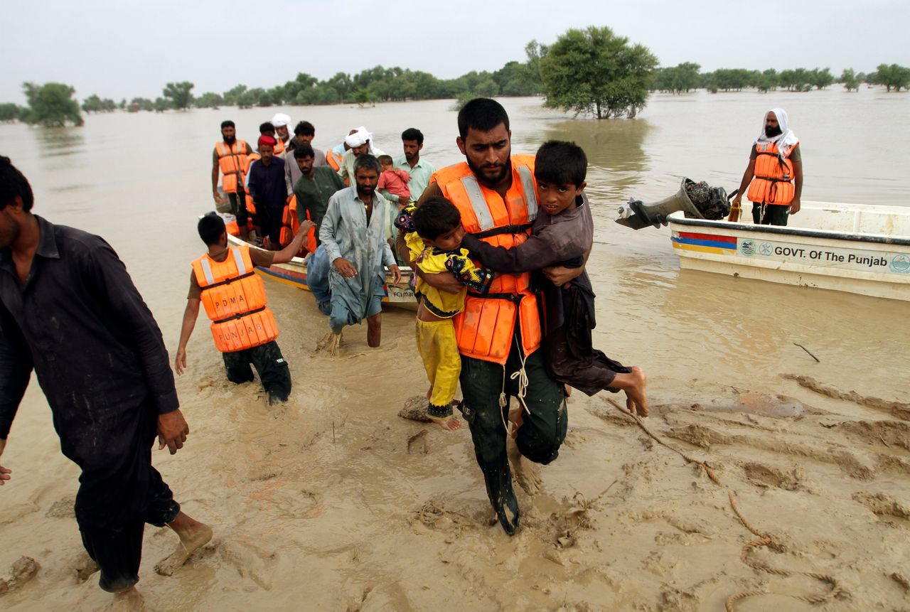 Army troops evacuate people from a flood-hit area in Rajanpur, district of Punjab, Pakistan, on Aug. 27, 2022.