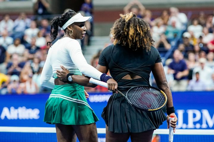 Serena and Venus Williams hugged each other after losing their match against Linda Noskova and Lucie Hradecka of the Czech Republic.
