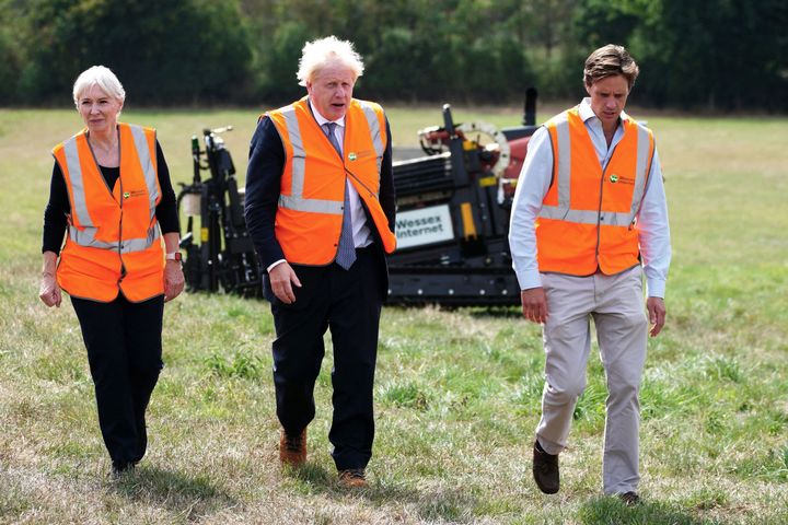 Boris Johnson and Nadine Dorries visit Henbury Farm in north Dorset, where Wessex Internet company is laying fibre optics in the field. 