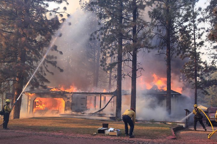 California Department of Forestry and Fire Protection firefighters effort   to halt  flames from the Mill Fire from spreading connected  a spot   successful  the Lake Shastina subdivision northwest of Weed, California, Friday, Sept. 2, 2022.