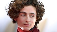 

    Timothée Chalamet's Blood-Red Backless Jumpsuit Is Getting A Lot Of Attention

