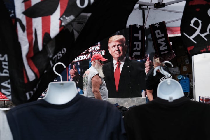 WILKES-BARRE, PENNSYLVANIA - SEPTEMBER 03: Merchandise is available for sale as people gather to hear former president Donald Trump speak as he endorses local candidates at the Mohegan Sun Arena on September 03, 2022 in Wilkes-Barre, Pennsylvania. Trump still denies that he lost the election against President Joe Biden and has encouraged his supporters to doubt the election process. Trump has backed Senate candidate Mehmet Oz and gubernatorial hopeful Doug Mastriano. (Photo by Spencer Platt/Getty Images)
