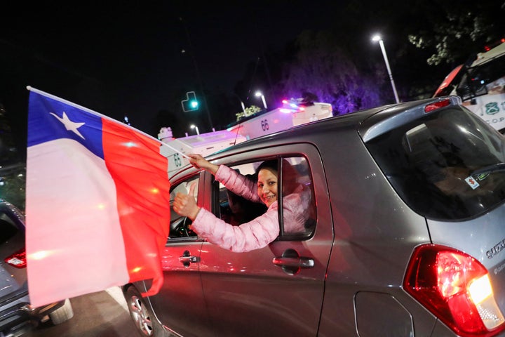 Supporters of the reject option react to early results of the referendum on a new Chilean constitution in Santiago, Chile, September 4, 2022. REUTERS/Ivan Alvarado