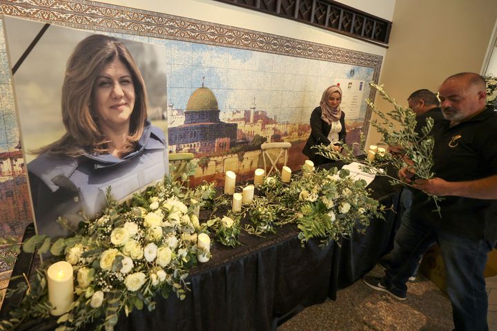 Mourners attend a memorial ceremony for Shireen Abu Aqleh, to mark the 40th day of the killing of the Al Jazeera journalist, in the West Bank city of Ramallah on June 19, 2022. 