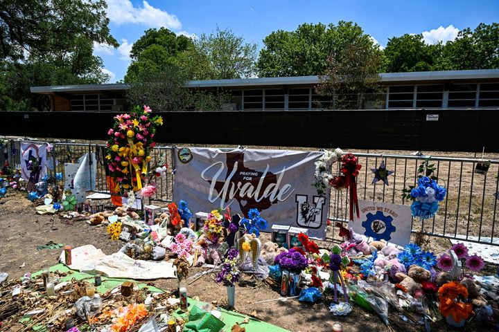 Mementos decorate a makeshift memorial to the victims of a shooting at Robb Elementary School in Uvalde, Texas, on June 30, 2022. - Nineteen young children and two teachers were killed when a teenage gunman went on a rampage at Robb Elementary on May 24 in America's worst school shooting in a decade. (Photo by CHANDAN KHANNA / AFP) (Photo by CHANDAN KHANNA/AFP via Getty Images)
