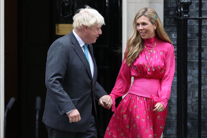 Britain's outgoing prime minister Boris Johnson and his wife Carrie.
