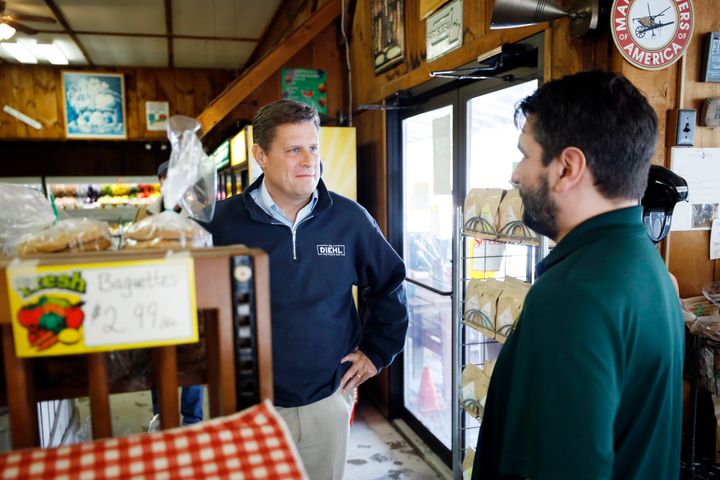 Republican candidate for governor Geoff Diehl greets Taft Farms owner Paul Tawczynski during a stop at the farm store in Great Barrington, Mass., as part of Diehl's campaign tour through the Berkshires on March 10, 2022. 