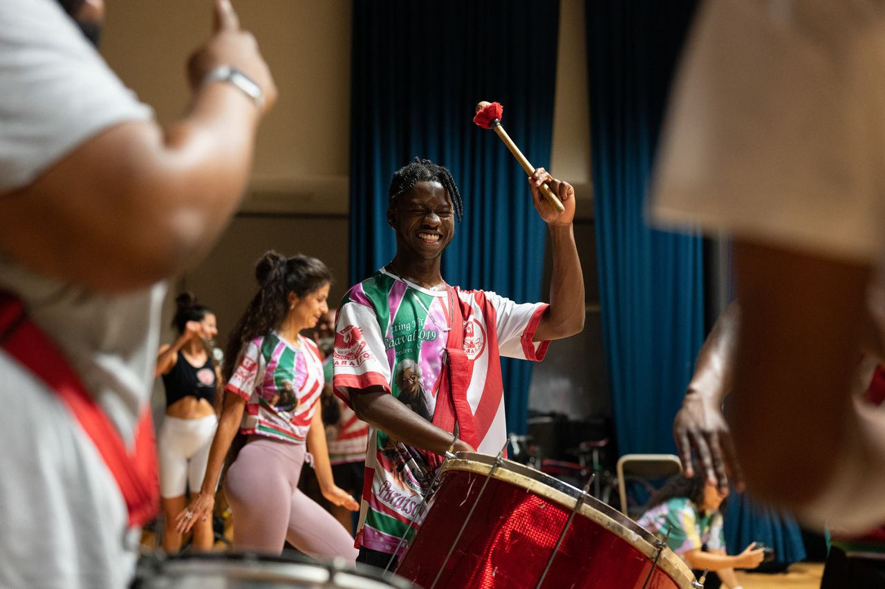 Paraiso School of Samba's Bateria accompanies Samba dancers as they rehearse ahead of the Notting Hill Carnival.