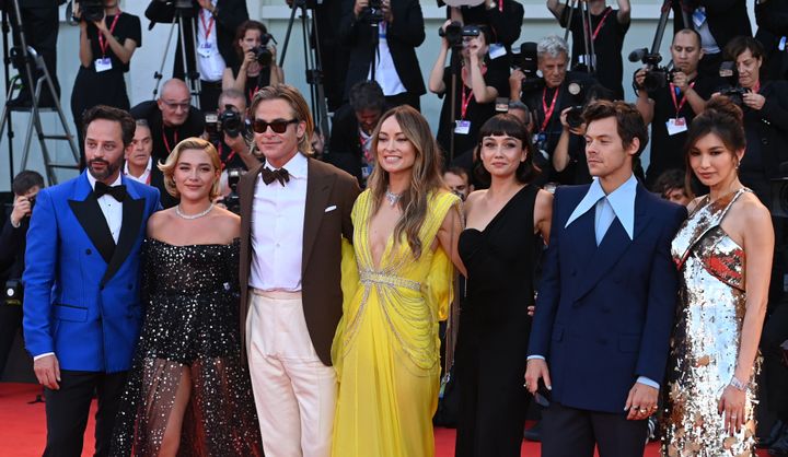 From left: Nick Kroll, Florence Pugh, Chris Pine, Olivia Wilde, Sydney Chandler, Harry Styles and Gemma Chan attend the "Don't Worry Darling" red carpet at the 79th Venice International Film Festival on Sept. 5.
