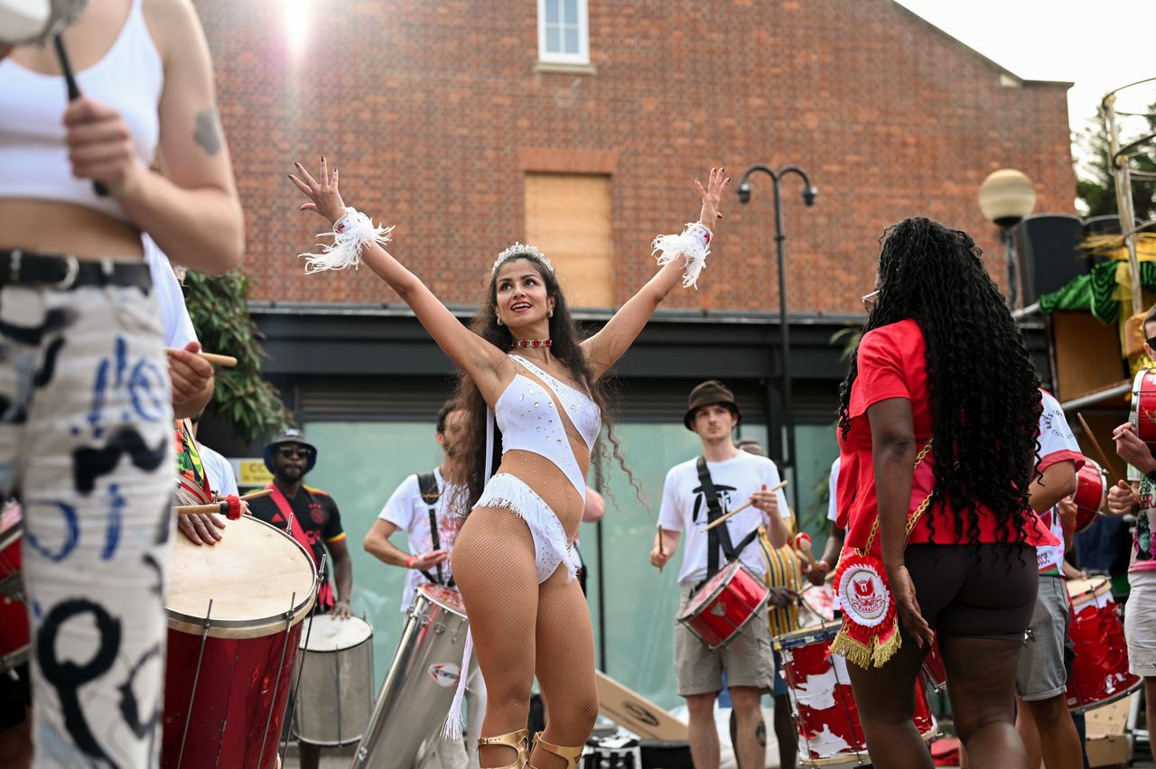 Amelia Karlsen, this year's Rainha, or Queen, for the Paraiso School of Samba, rehearses ahead of this year's Notting Hill Carnival parade. Paraiso School of Samba will open this year's parade and be the first to walk and dance down the streets of Notting Hill on Carnival Monday.