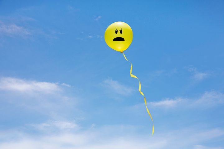 Yellow balloon depicts a mad face