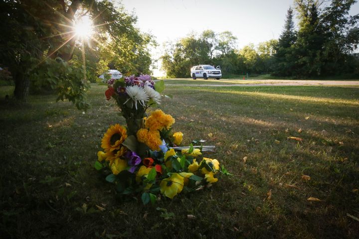Flowers sit outside the house where one of the stabbing victims was found in Weldon, Saskatchewan, Canada, on September 6, 2022. One of two brothers who were the target of a massive manhunt in Canada after allegedly carrying out a stabbing spree that left 10 dead and 18 wounded has been found dead, police said on September 5, 2022. The killings in the remote James Smith Cree Nation Indigenous community and the town of Weldon in Saskatchewan province in western Canada are among the deadliest incidents of mass violence to ever hit the nation.