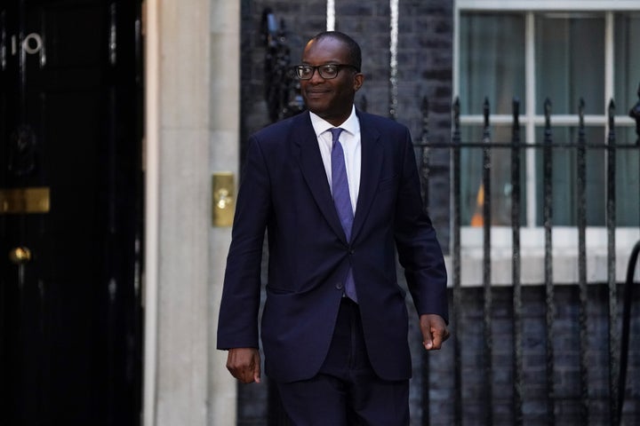 Newly installed chancellor of the exchequer Kwasi Kwarteng leaving Downing Street.