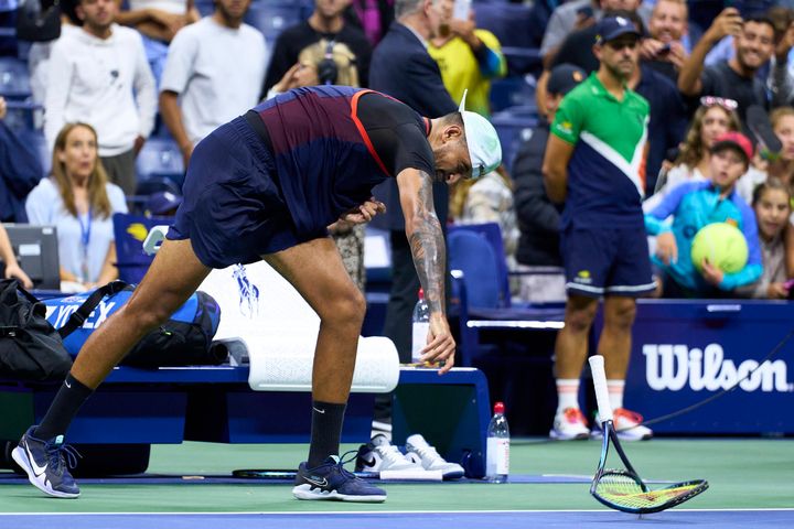 Nick Kyrgios smashes his racket after his defeat at the U.S. Open.