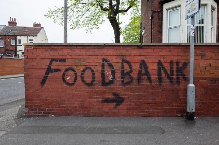 A wall points towards a local food bank in Harehills, in Leeds.