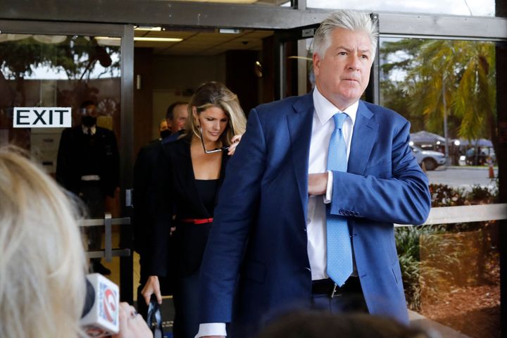 Evan Corcoran and Lindsey Halligan, part of former President Donald Trump's legal team, leave the Paul G. Rogers Federal Building & Courthouse after a court hearing in West Palm Beach, Florida on September 1, 2022. U.S. District Judge Aileen Cannon is facing sharp criticism following her decision to grant a request by Trump’s legal team for an independent arbiter to review documents obtained during an FBI search of his Florida property last month.