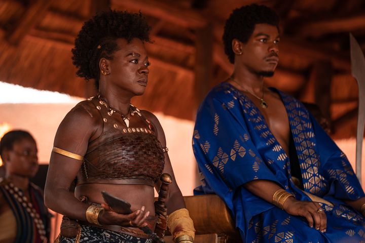 Viola Davis plays Nanisca and John Boyega plays King Ghezo in "The Woman King."