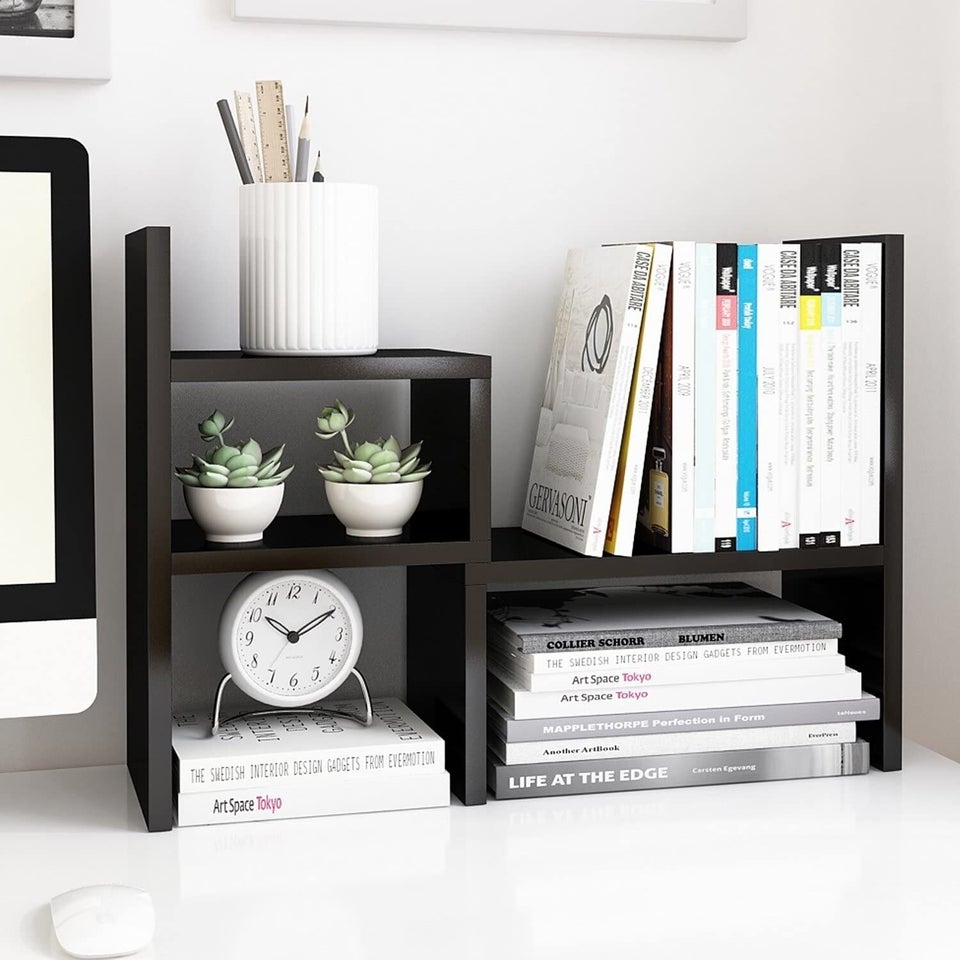 An adjustable wood shelf to put next to your computer