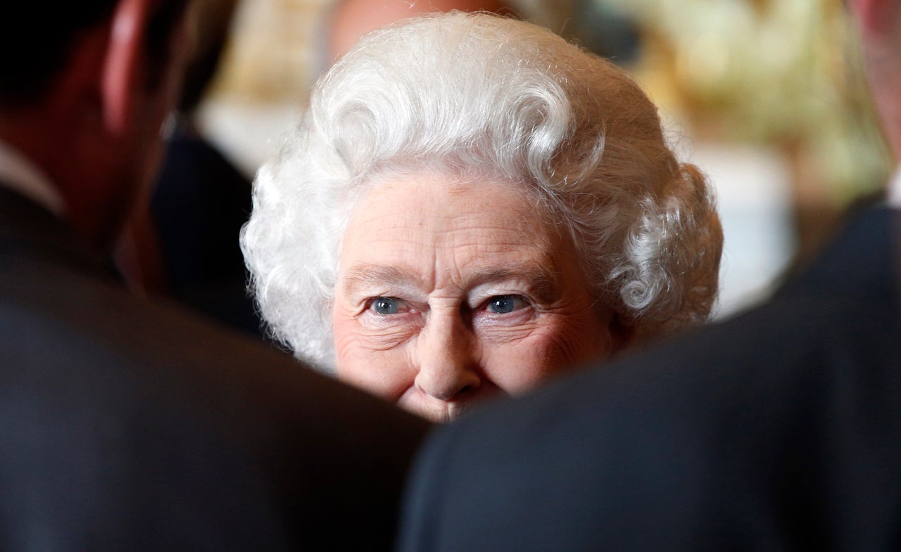 Queen Elizabeth II greets guests at a reception for winners of The Queen's Awards for Enterprise 2014 at Buckingham Palace on July 14, 2014.