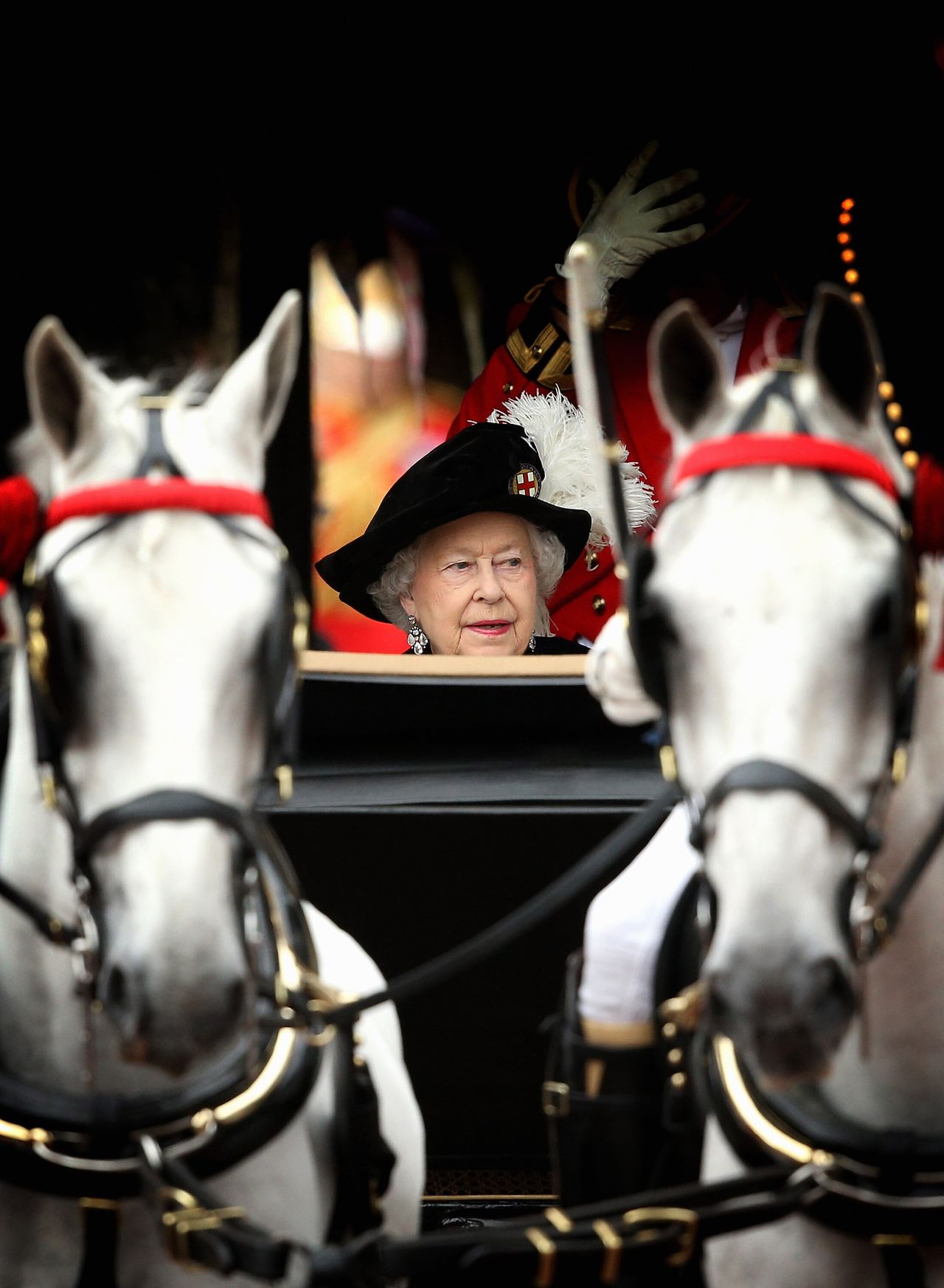 Queen Elizabeth II travels by carriage after the Most Noble Order of the Garter Ceremony on June 16, 2014 in Windsor, England.