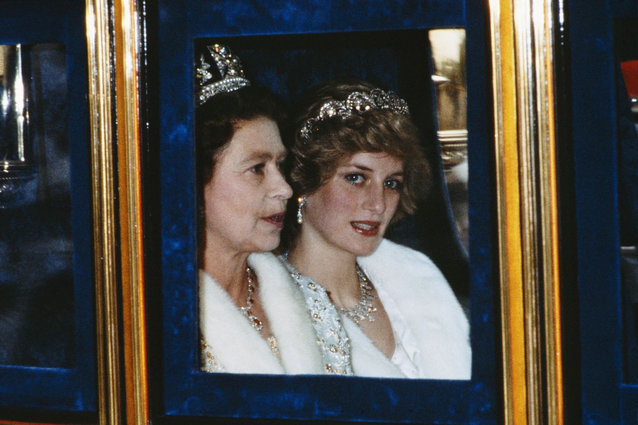 The Princess of Wales and the Queen attend the Opening of Parliament in London in November 1982.